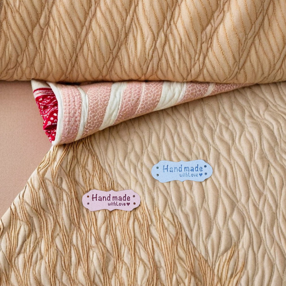 Sewing Label - 100 étiquettes en daim gaufré faites